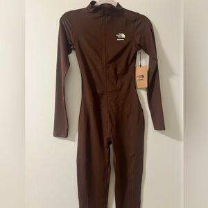 Skims x The north face collab. Refina bodysuit size small. Never worn.